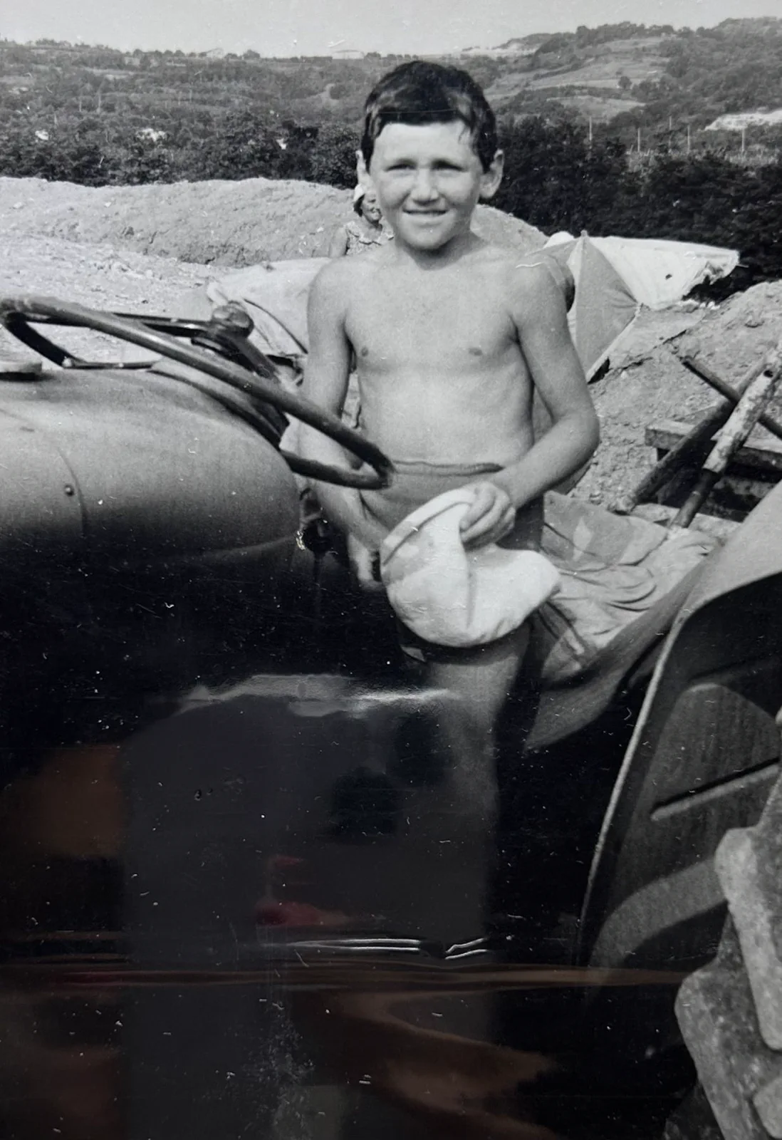 Historic photo: a young Tamellini on a tractor